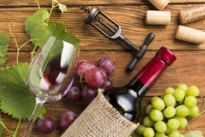 Wine with Grapes and fall leaves