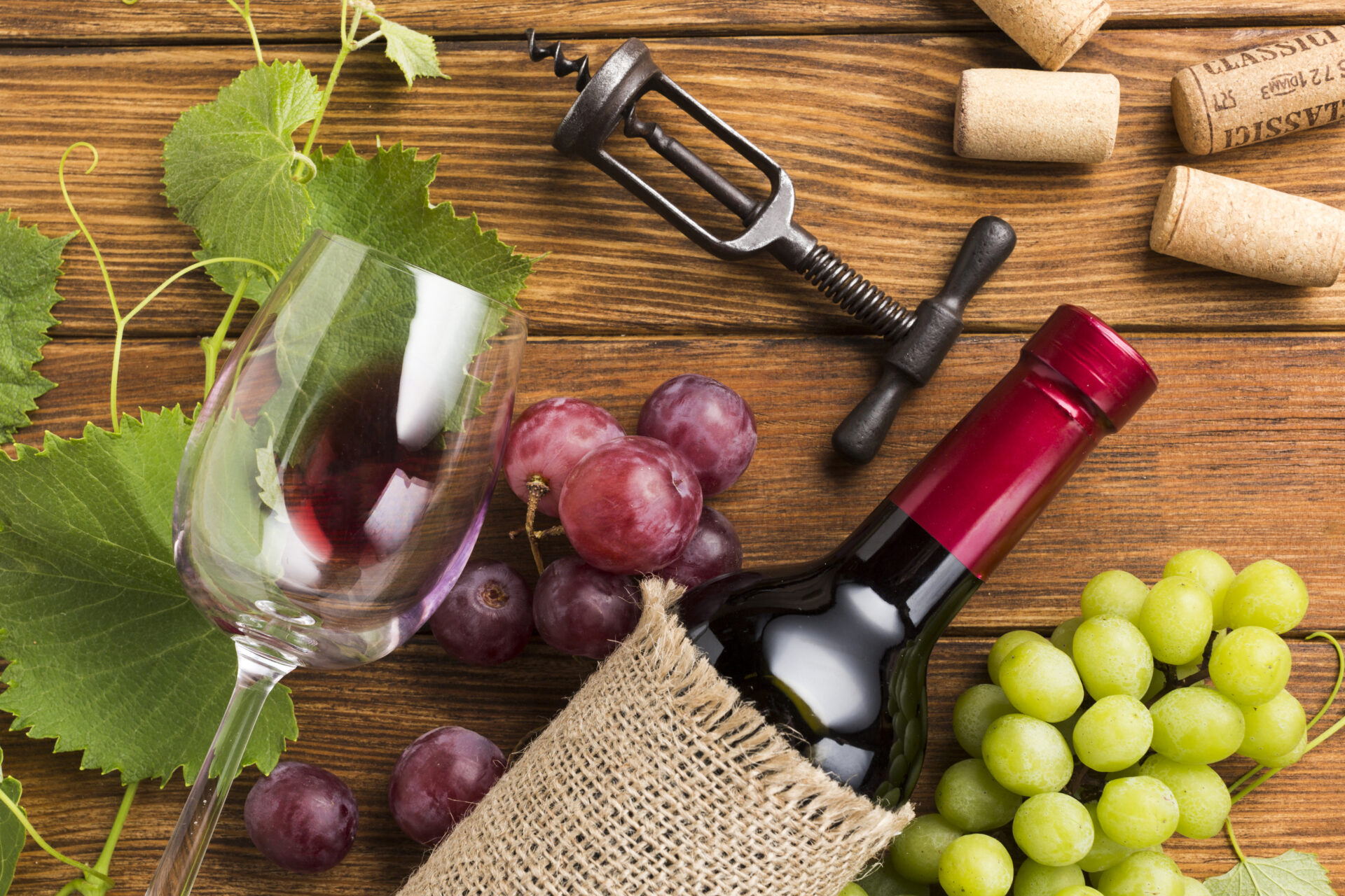Wine with Grapes and fall leaves