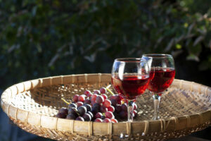 Red Wine & Grapes on Weaved platter
